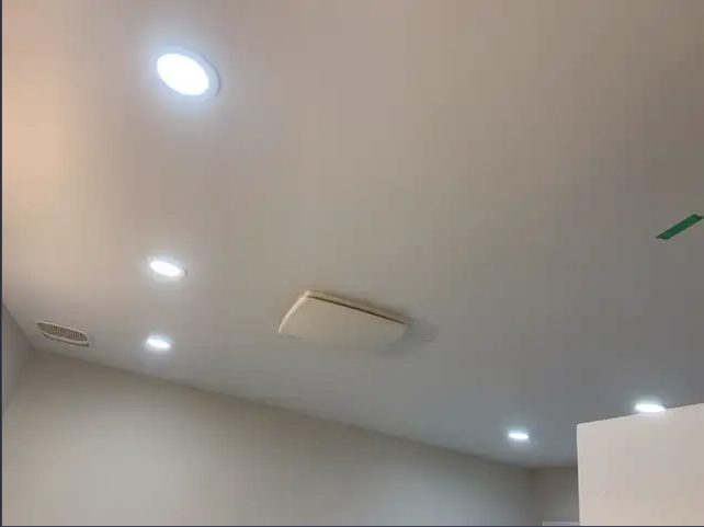 White ceiling with recessed LED pot lights